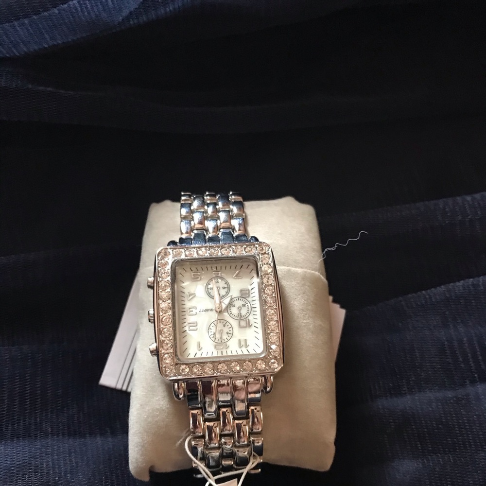 Silver watch with gem stone